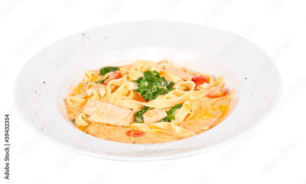 tasty pasta with cream, salmon, cheese and parsley close up tasty pasta with cream, salmon, cheese and parsley close up