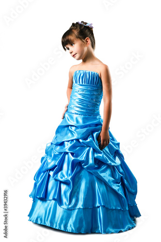 6 years old girl wearing contemporary dress isolated on white ba