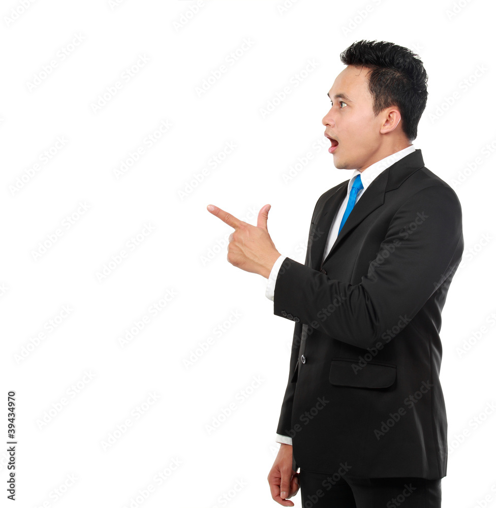 business man surprisingly pointing at something business man surprisingly pointing at something