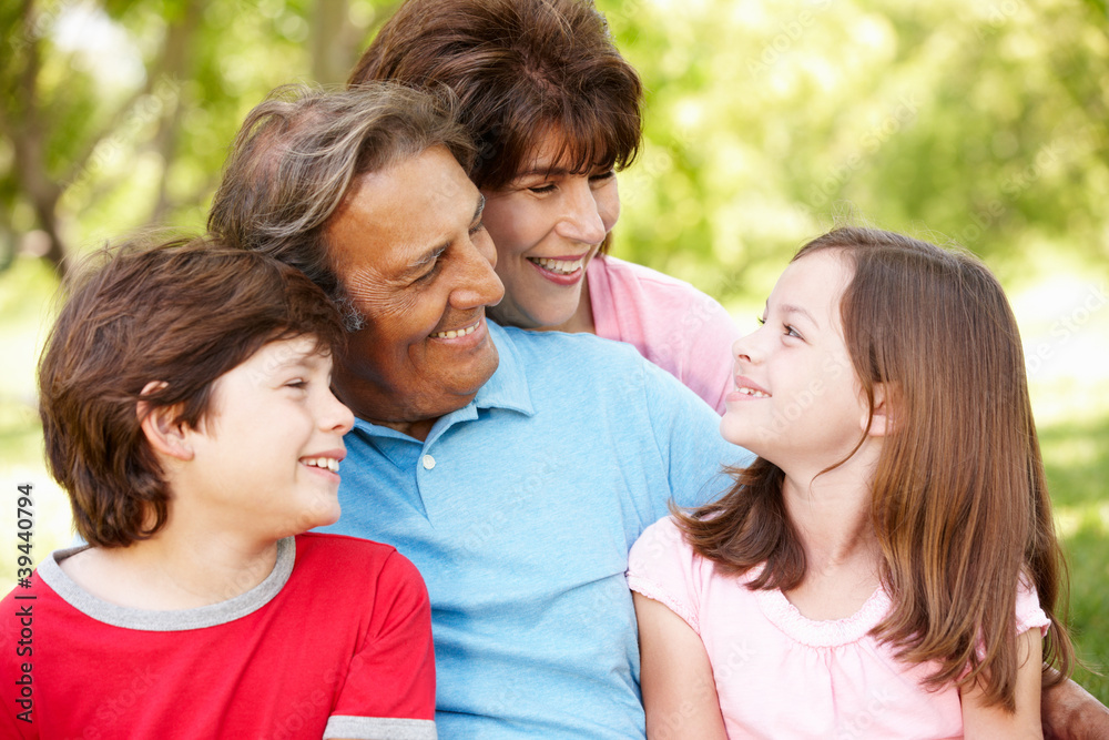 Hispanic grandparents and grandchildren outdoors Hispanic grandparents and grandchildren outdoors