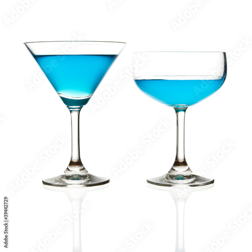 wine glass and blue cocktail isolated