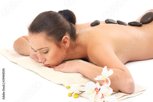 Attractive woman getting spa treatment isolated on white