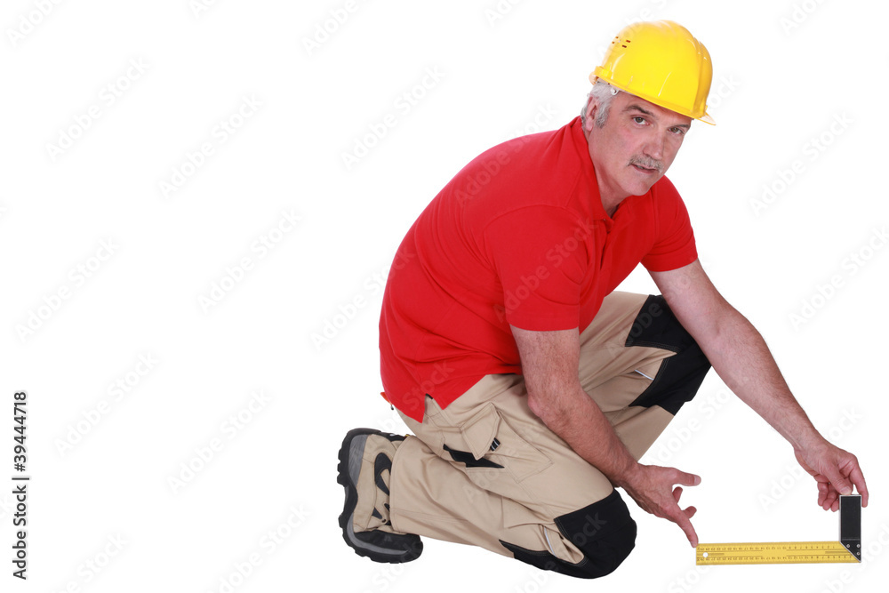 Tradesman holding a try square Tradesman holding a try square
