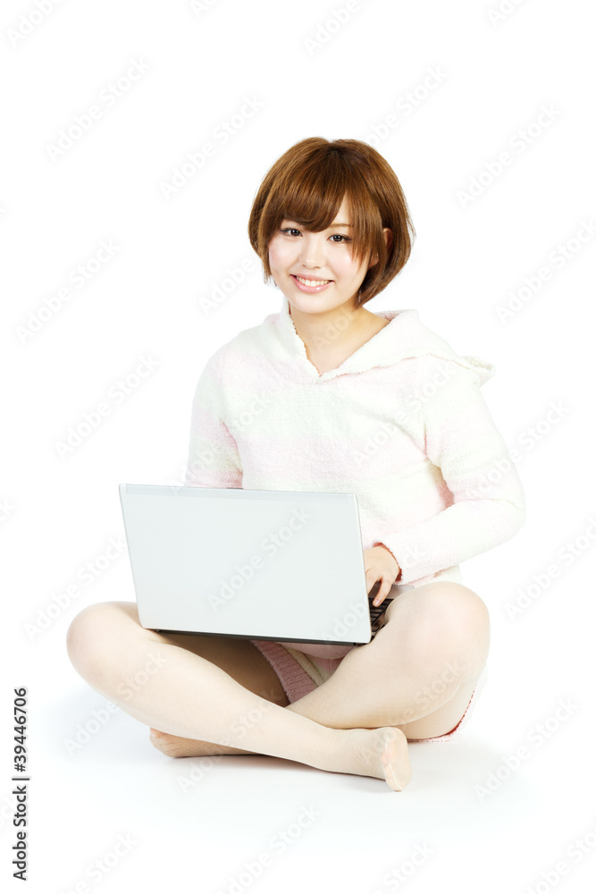Beautiful asian woman using a laptop computer Beautiful asian woman using a laptop computer