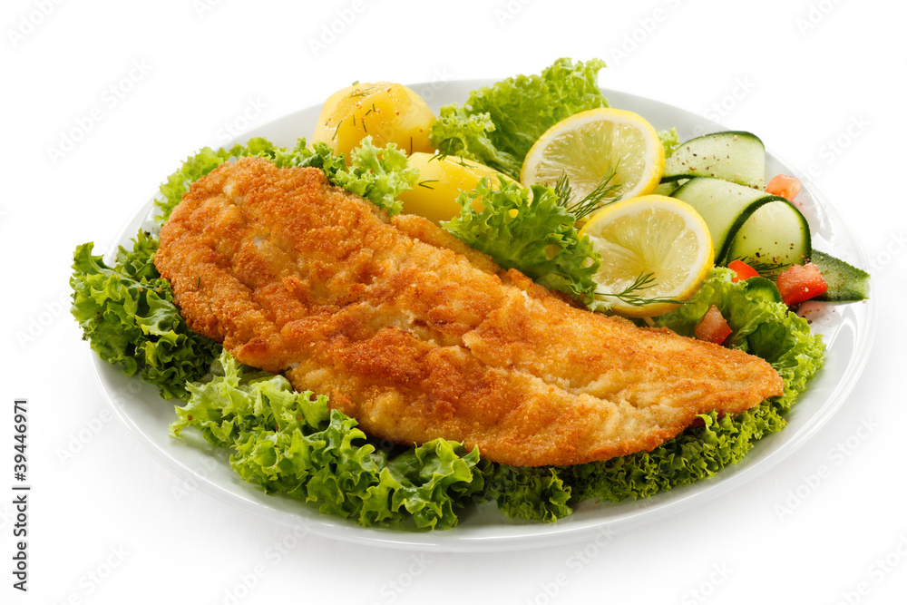 Fish dish - fried fish fillet with vegetables Fish dish - fried fish fillet with vegetables
