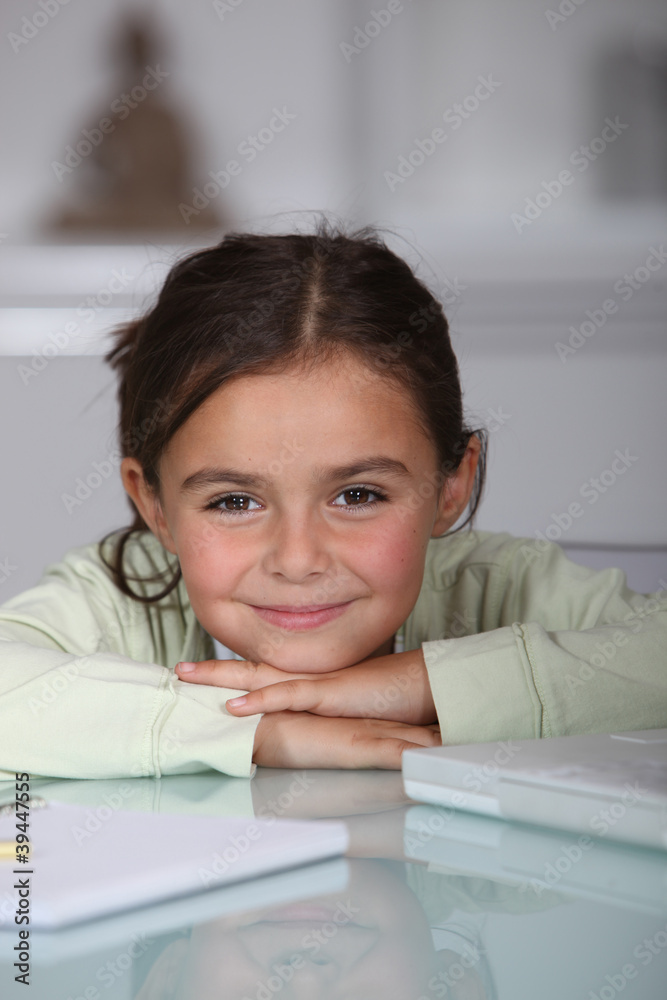 cute little girl doing her homework cute little girl doing her homework