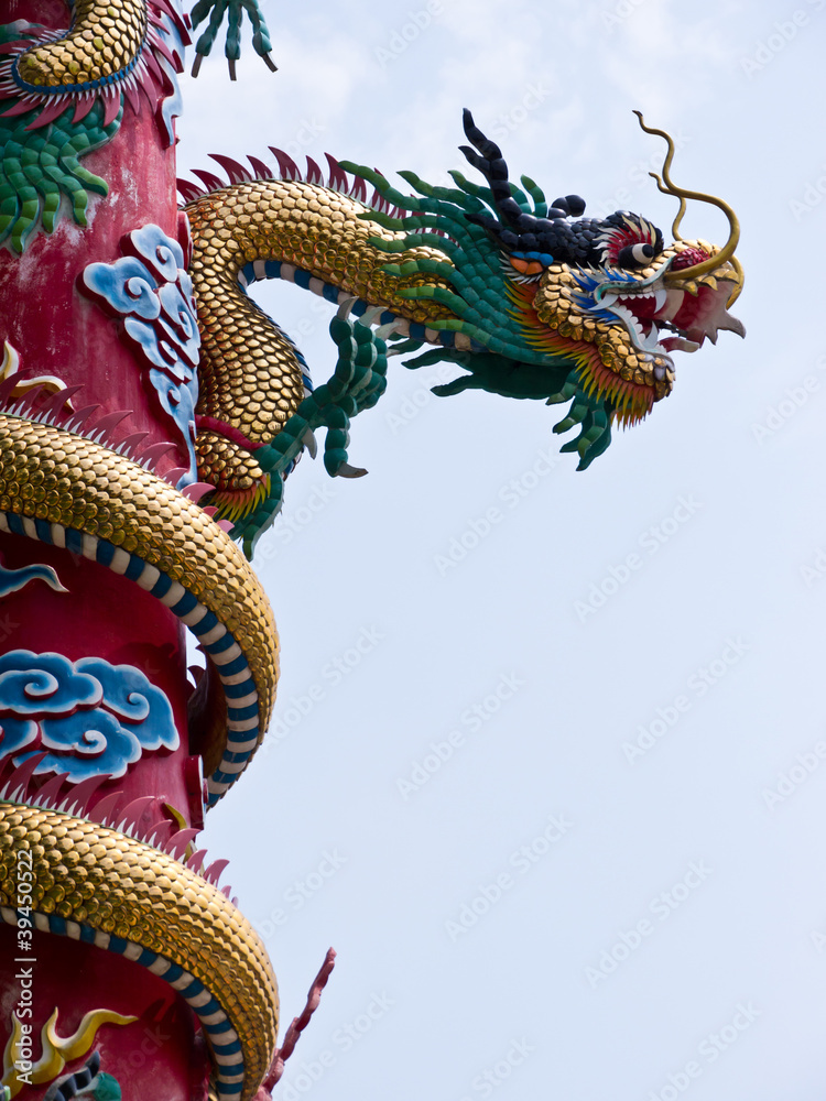 Dragon statue on post in Buddhist temple Dragon statue on post in Buddhist temple