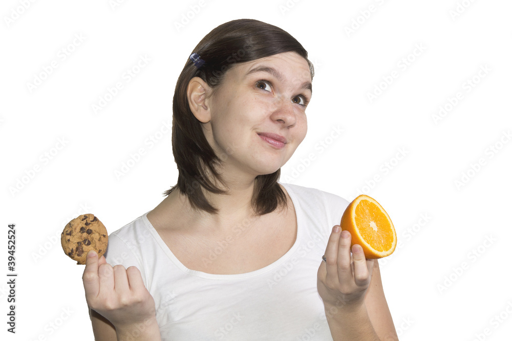 Cookie or orange - that is the question, isolated on white Cookie or orange - that is the question, isolated on white