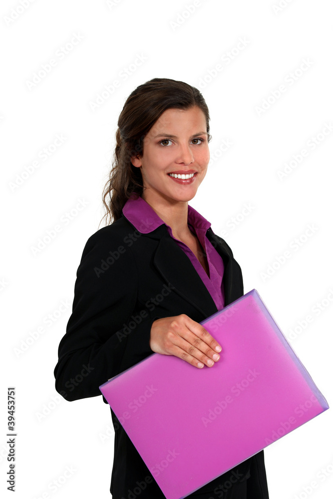Woman holding bright pink folder Woman holding bright pink folder