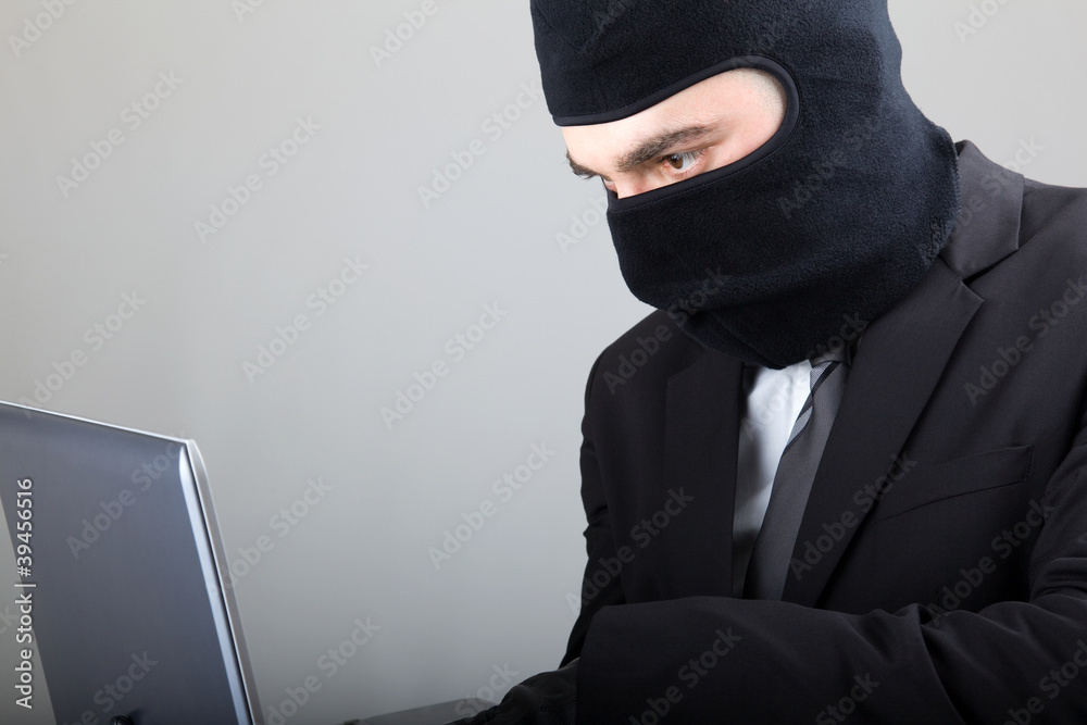 Computer Hacker in suit and tie Computer Hacker in suit and tie