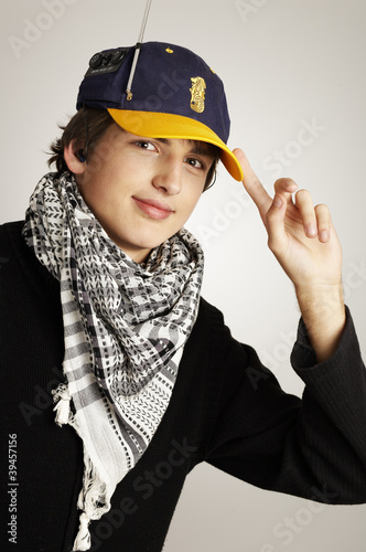 Young man wearing a radio cap