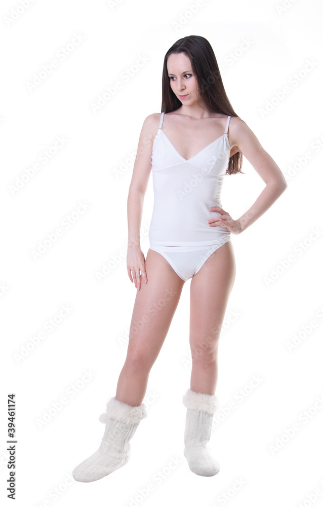 A beautiful young woman in underwear isolated on white