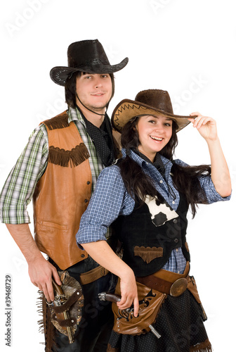 young cowboy and cowgirl. Isolated