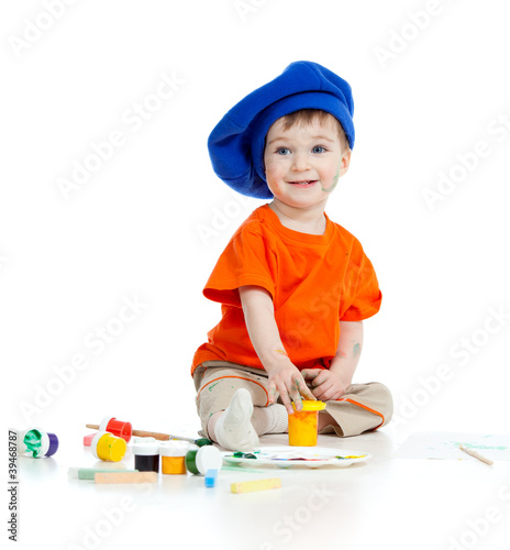 small artist child with paints