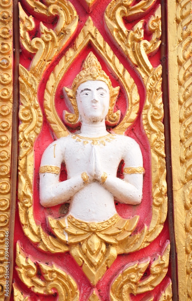 Fototapeta premium Buddhist art stucco on wall