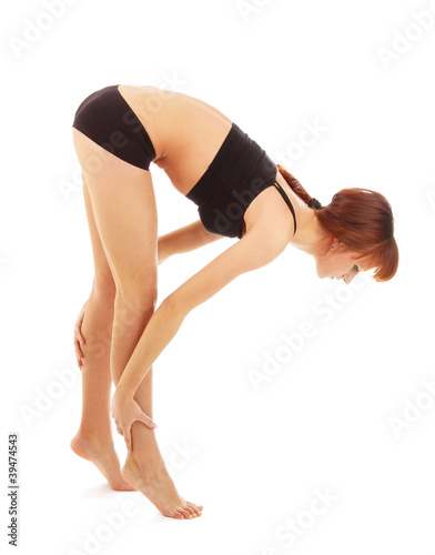 Young woman doing exercise isolated on white background