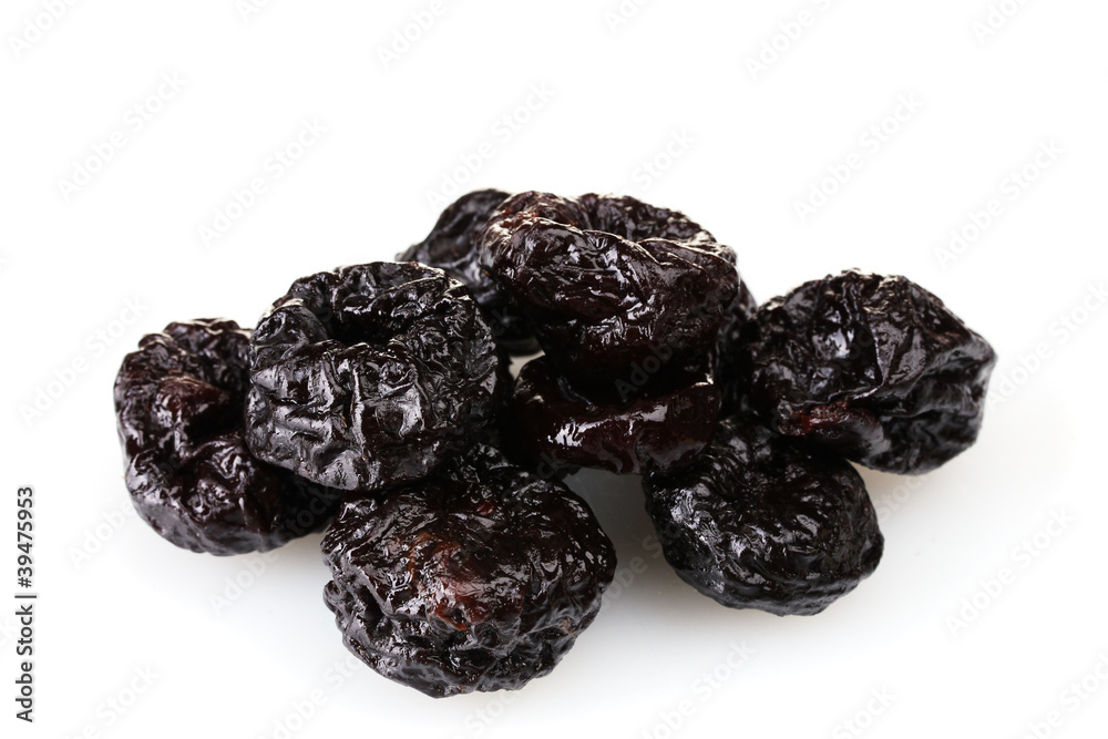 yummy dried plums isolated on white yummy dried plums isolated on white