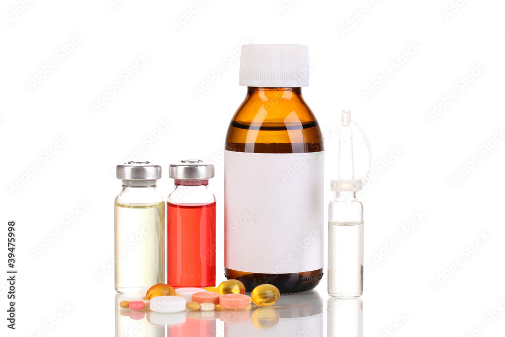 Medical bottles with tablets and ampoules isolated on white Medical bottles with tablets and ampoules isolated on white