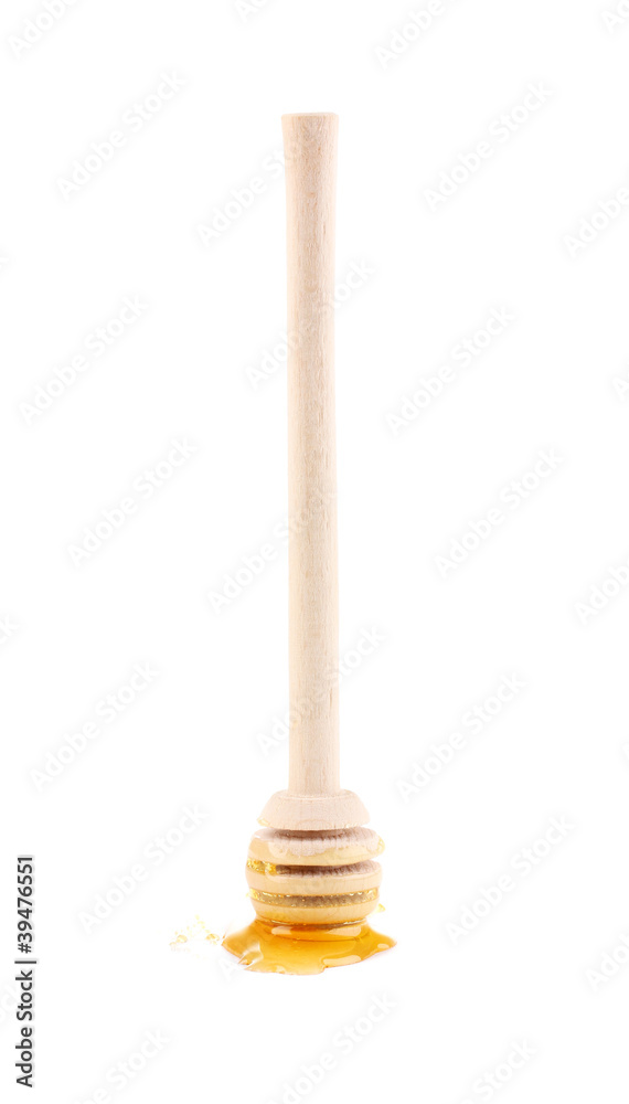 Sweet honey on drizzler isolated on white Sweet honey on drizzler isolated on white