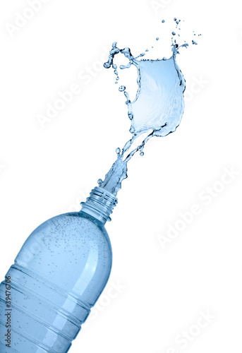 Bottle and water splash isolated on white