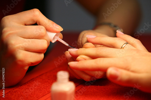 Closeup of hands doing manicure