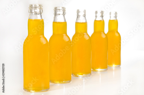 bottled orange juice in bottles