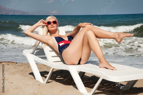 Pin up girl relaxing on a beach