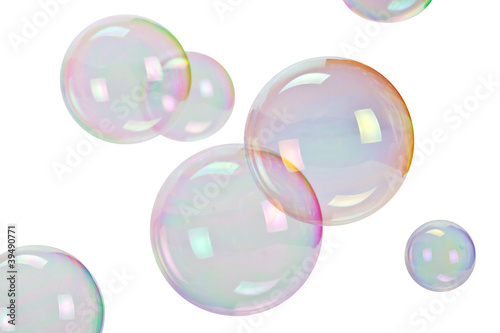 Soap bubbles over white background