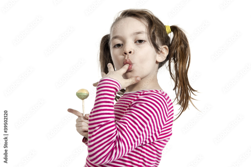 Little girl with a lollipop, isolated on white background Little girl with a lollipop, isolated on white background