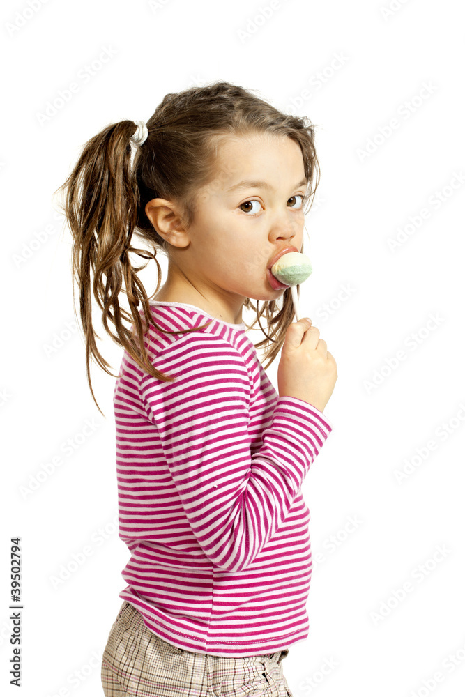 Close-up of adorable little girl with a lollipop Close-up of adorable little girl with a lollipop