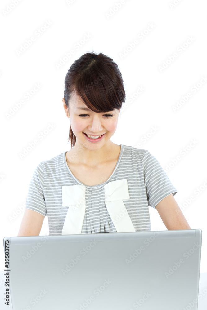 Beautiful asian woman using a laptop computer Beautiful asian woman using a laptop computer