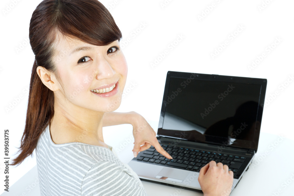 Beautiful asian woman using a laptop computer Beautiful asian woman using a laptop computer
