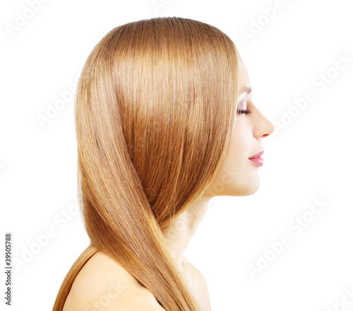Girl with beautiful straight hair isolated on a white