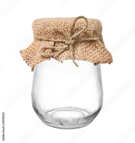 Empty glass jar with sacking and rope