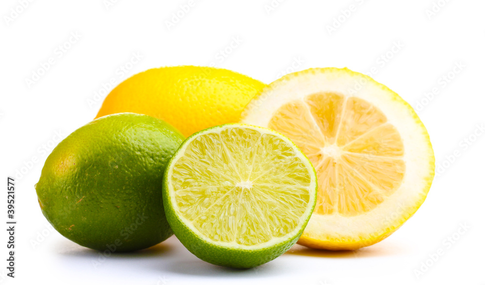 Fresh lime and lemon isolated on white