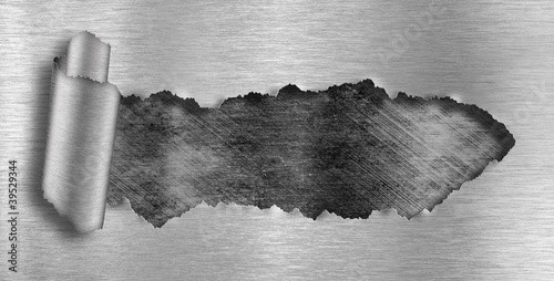 metal background ripped hole