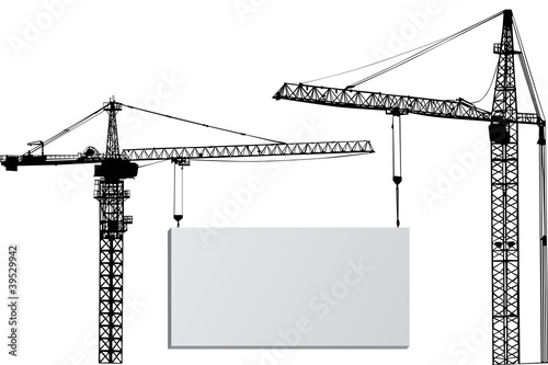 isolated two cranes with billboard