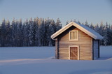 Typical swedish hut in winter