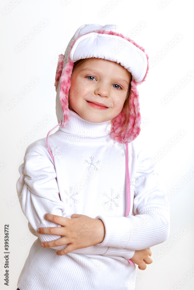 Kid in winter wear against white background Kid in winter wear against white background