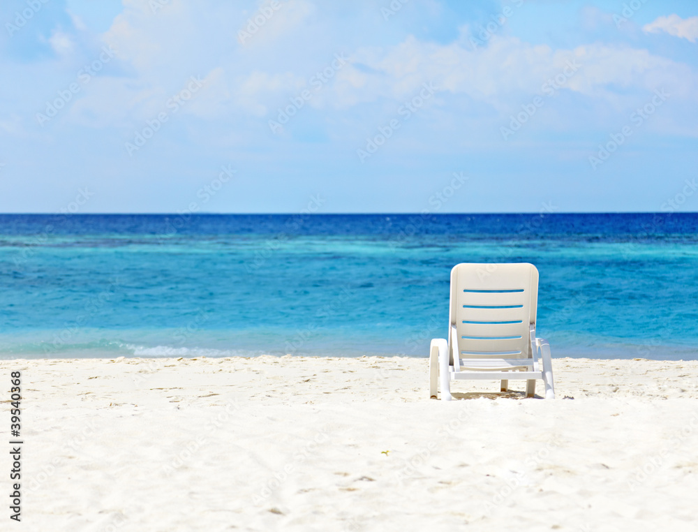White chair  on the beach
