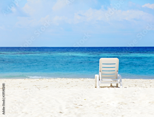 White chair  on the beach