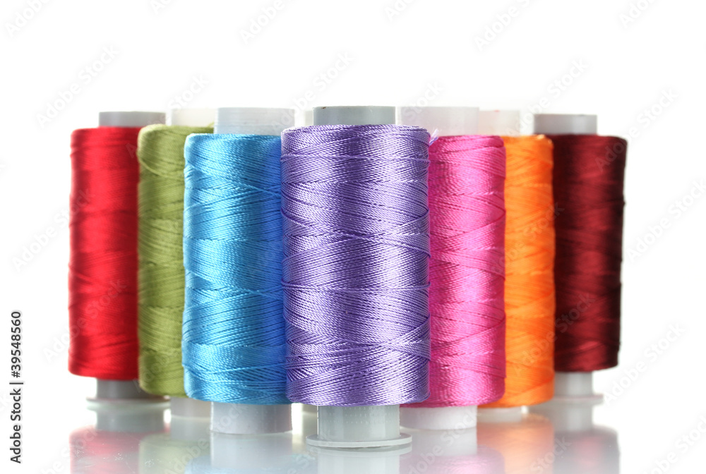 bright bobbin thread isolated on white. bright bobbin thread isolated on white.