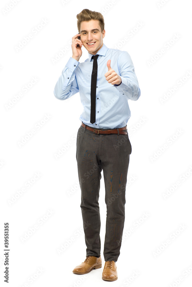 Young businessman showing thumbs up Young businessman showing thumbs up