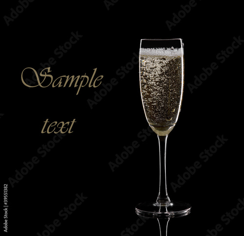 Glass of sparkling wine with bubbles