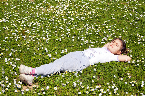 little girl on grass
