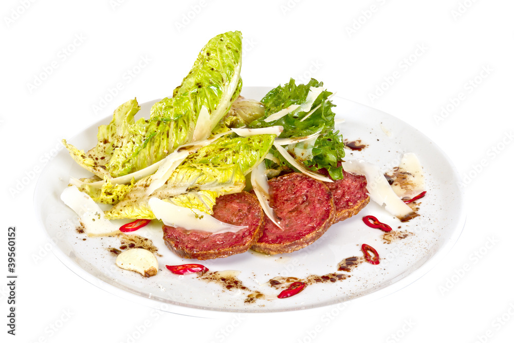 Salad from fried sausages, lettuce with sour cream sauce Salad from fried sausages, lettuce with sour cream sauce