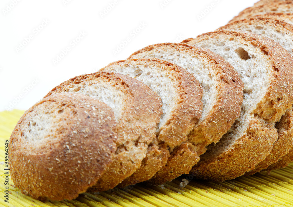 Fresh bread on a bamboo napkin.