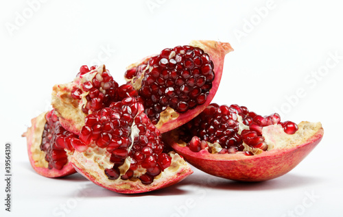 Red pomegranate fruit. Isolated on white background