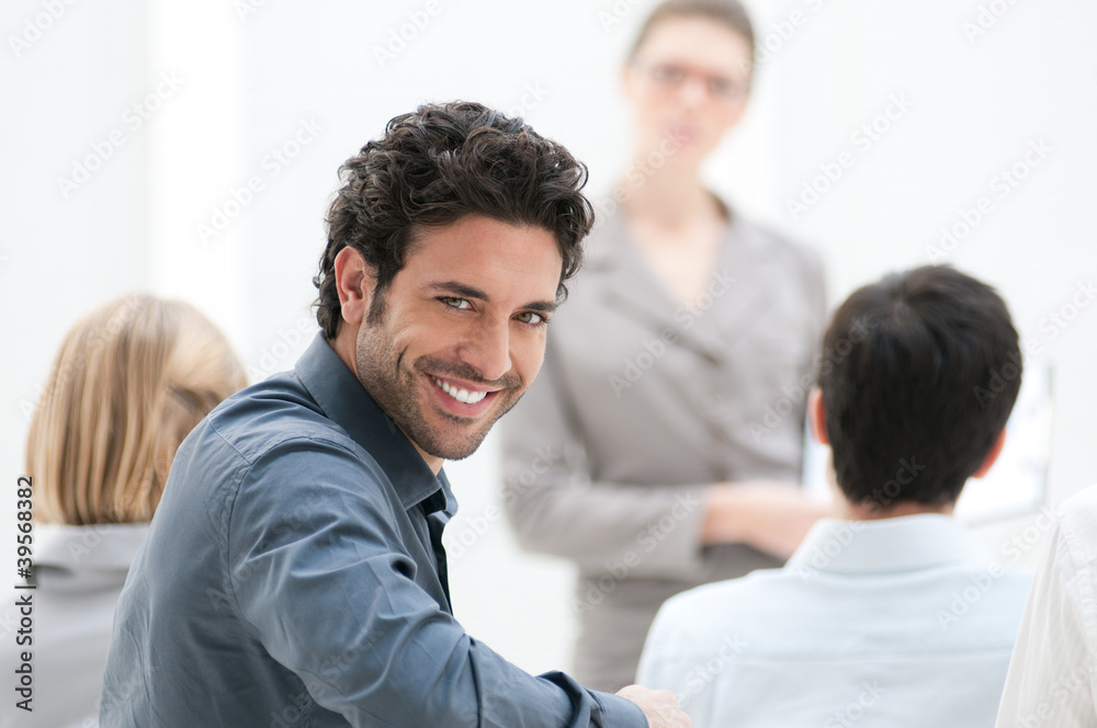 Smiling man at meeting Smiling man at meeting