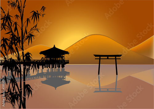 pavilion and reflection at orange sunset